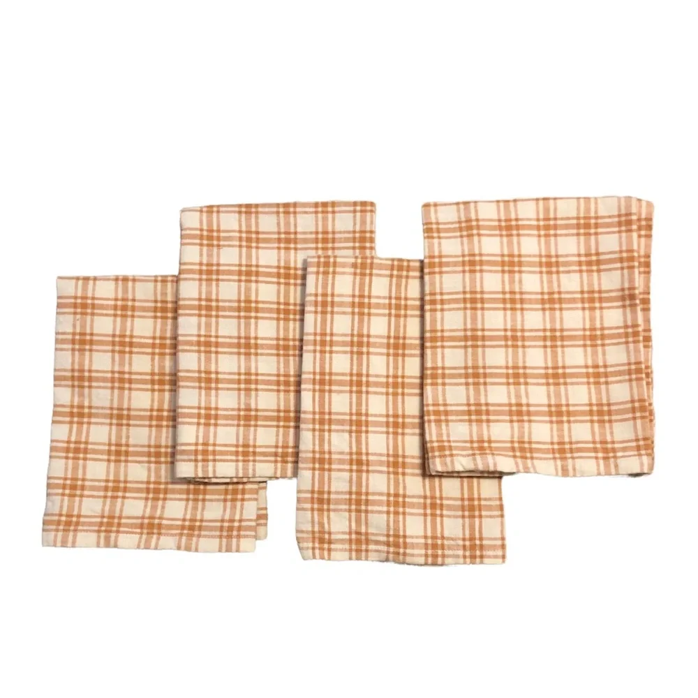 West Elm set of four orange and white checked cloth napkins